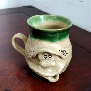 Hand Crafted Funny Face Mug signed TOR, Green Beige Ceramic